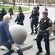 Buffalo police officers shove a 75-year-old man who Trump suspects may have been an operative for antifa.